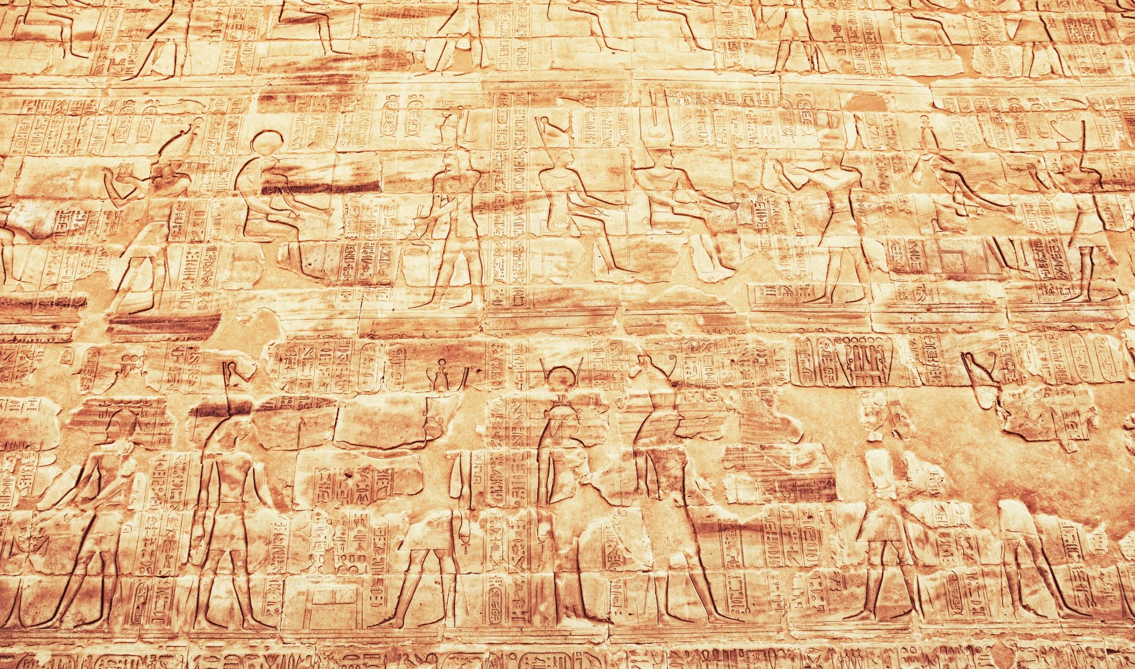 Ancient hieroglyphics on Egyptian stone wall