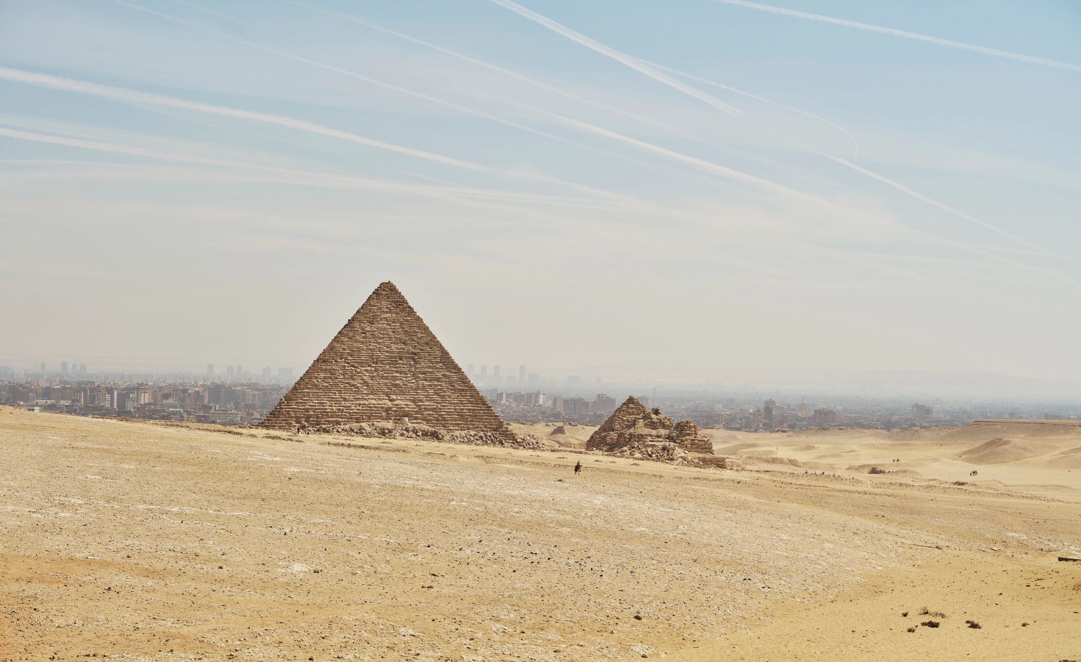 Wide view of the Giza pyramids and desert landscape in Egypt