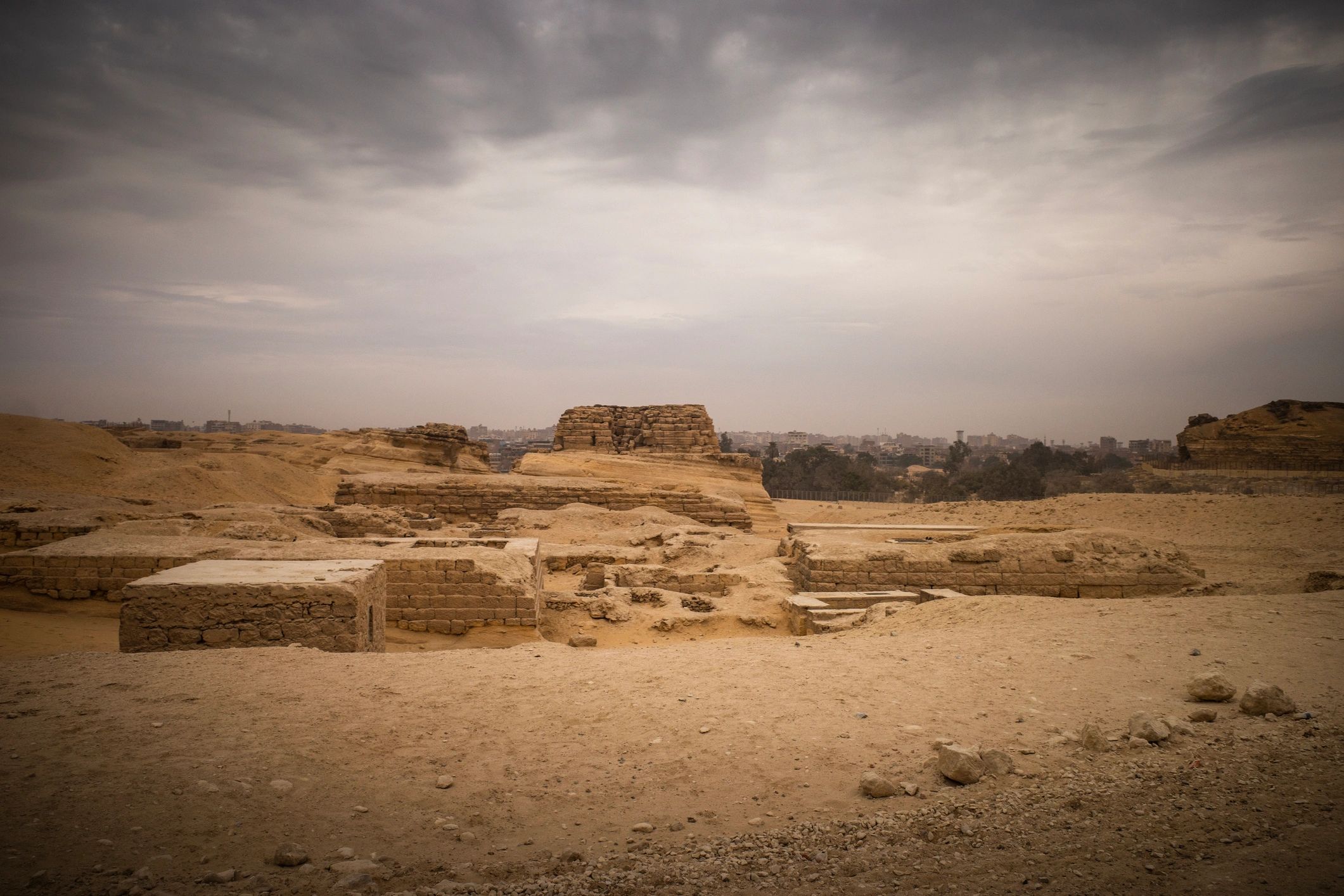 Ancient desert ruins under cloudy sky in Egypt