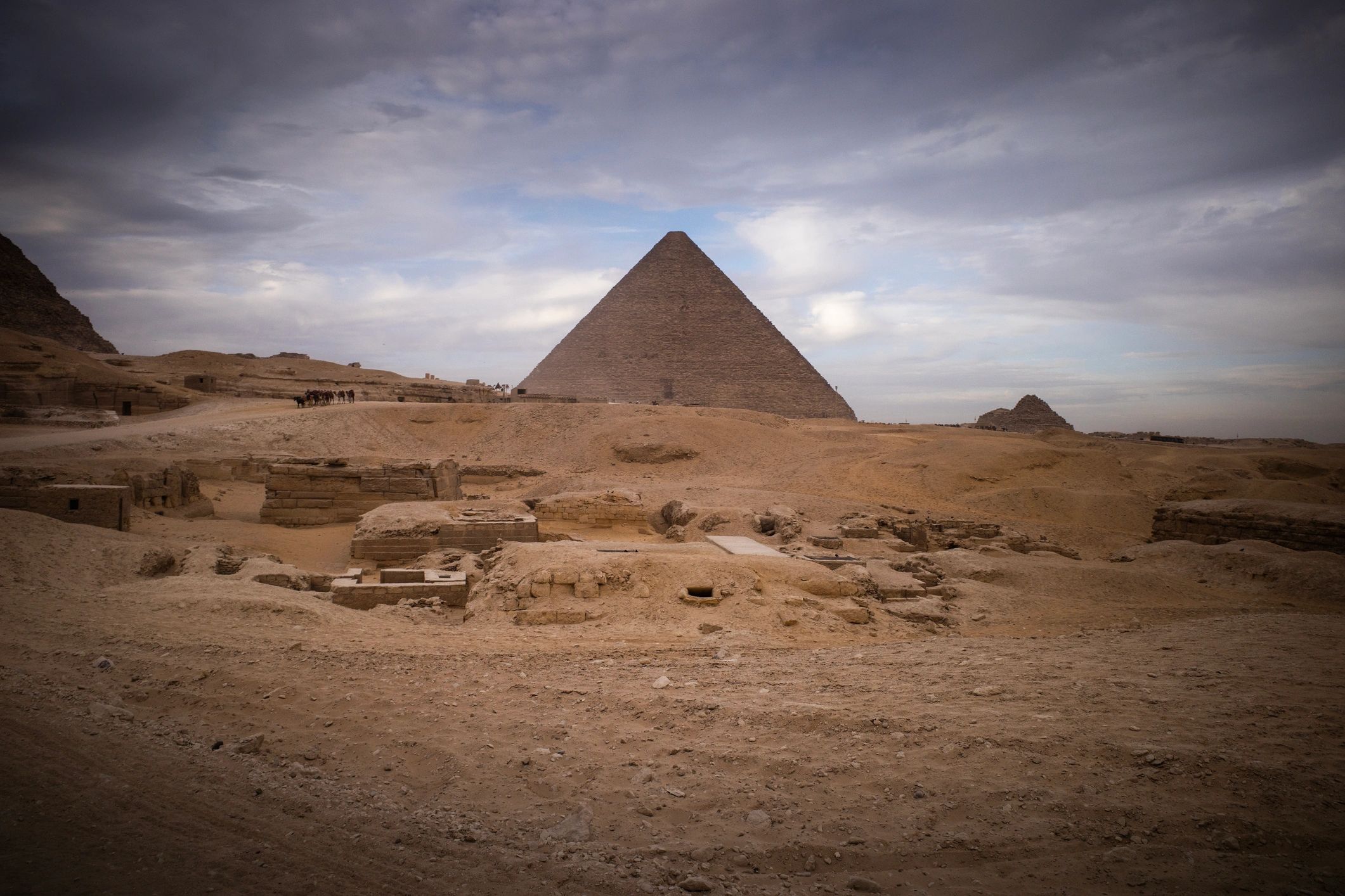 Great pyramid at Giza under a dramatic sky