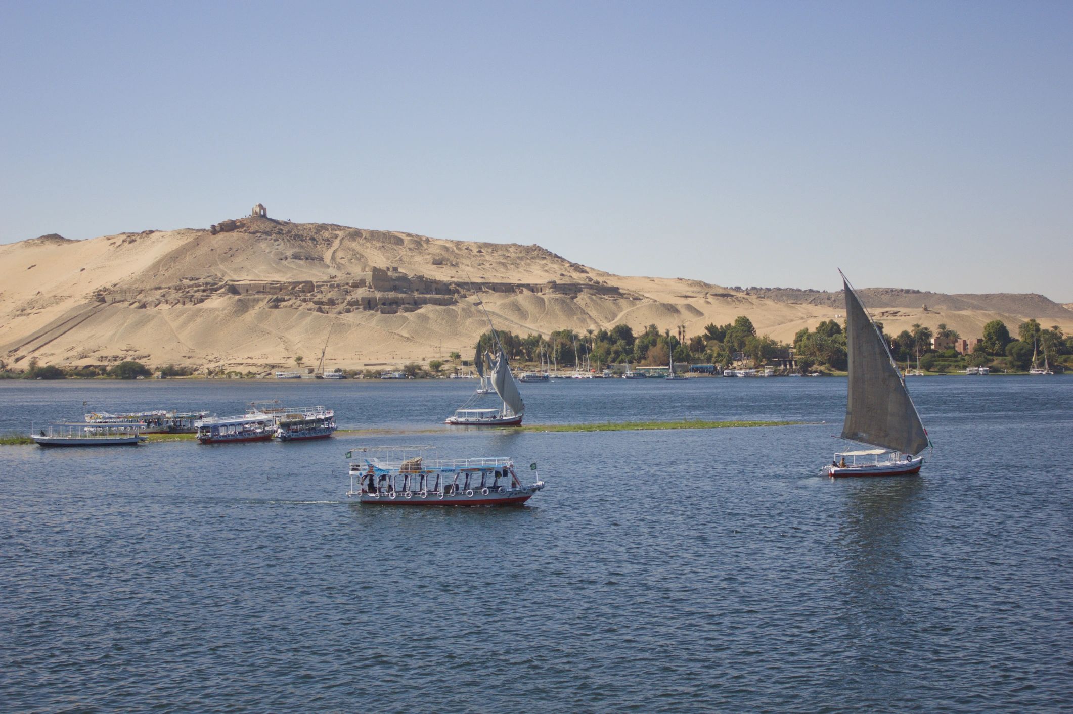 Boats and feluccas on the Nile River near Aswan, Egypt